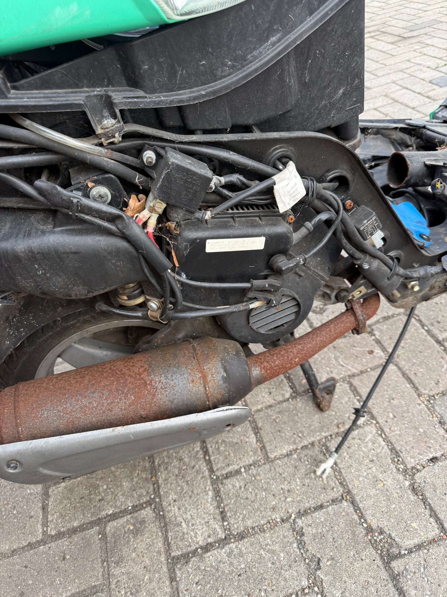 Piaggio zip bimodale uitlaat