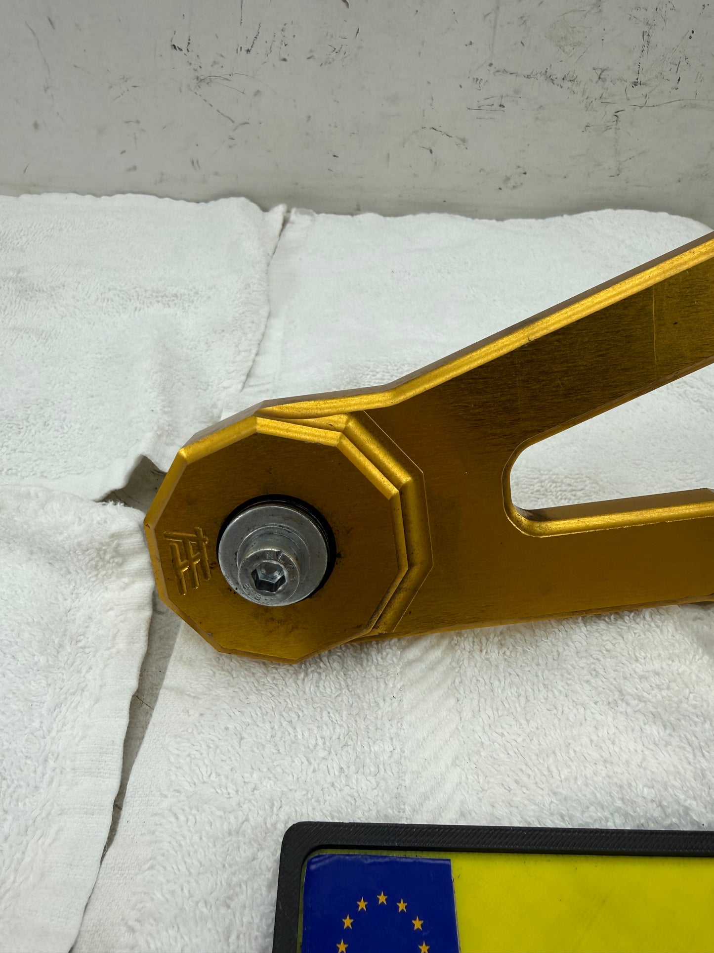 Piaggio HT uitlaat brace goud 125cc 180cc