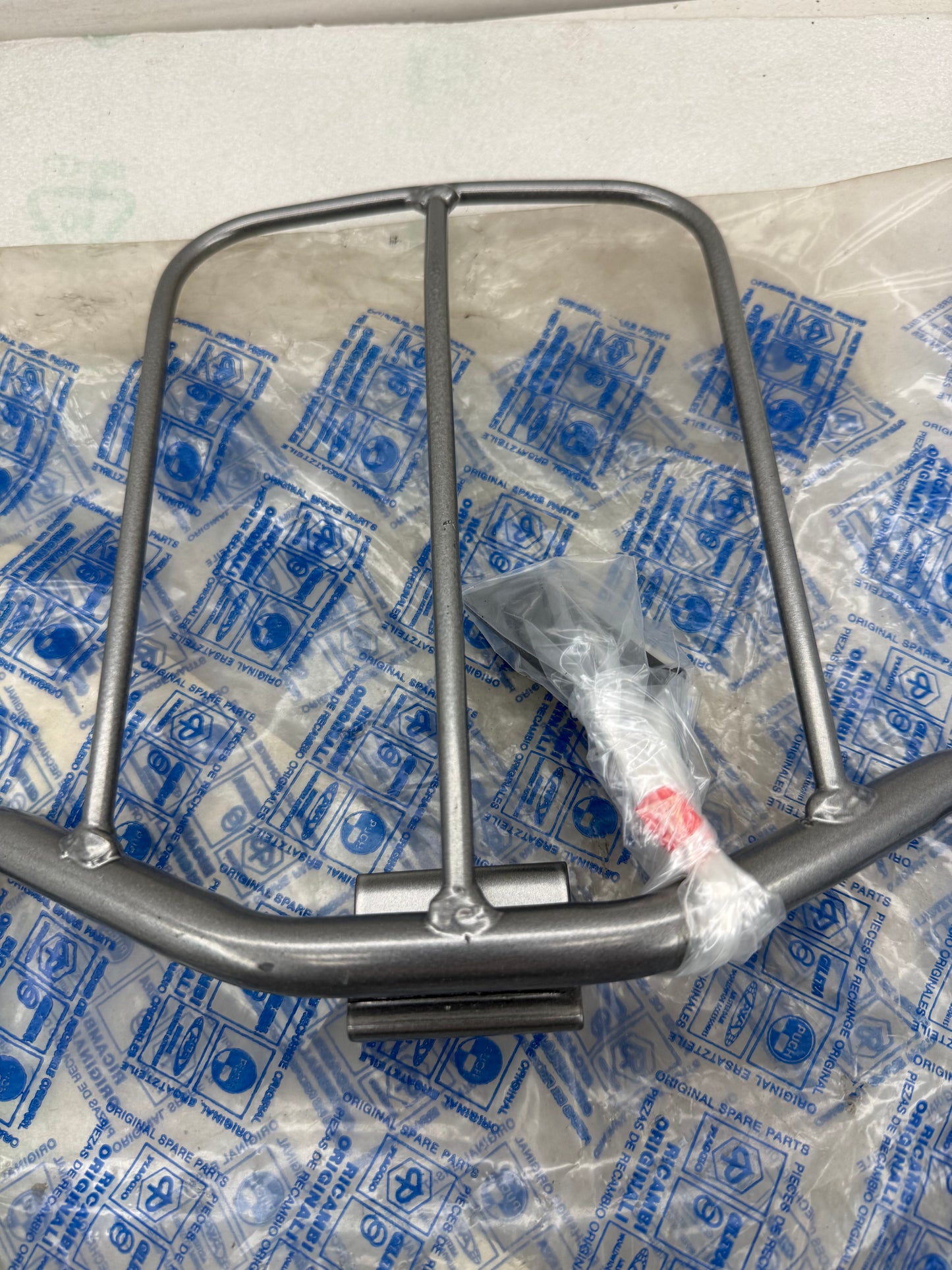 Piaggio TPH voorkapbeugel NIEUW (nos)